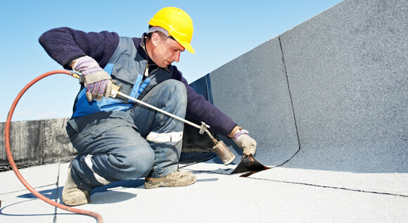 Help finding the best flat roof material and how to get it insured